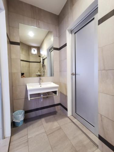 Ένα μπάνιο στο Melody Whole Or Suite Room