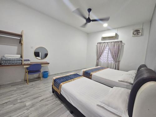 Ένα ή περισσότερα κρεβάτια σε δωμάτιο στο Melody Whole Or Suite Room