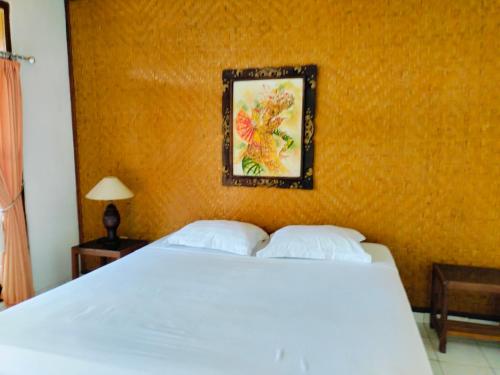 Katil atau katil-katil dalam bilik di Bayumantra Bungalows
