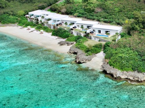 an aerial view of a resort on a beach at Crystal Villa Miyakojima Sunayama Beach in Miyako-jima