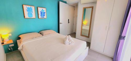 Ένα ή περισσότερα κρεβάτια σε δωμάτιο στο Cozy Apartment-1BR T2-524
