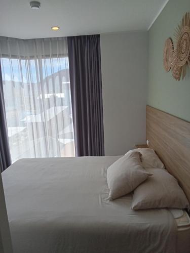 Ένα ή περισσότερα κρεβάτια σε δωμάτιο στο Modern Condo - 1BR T3-528