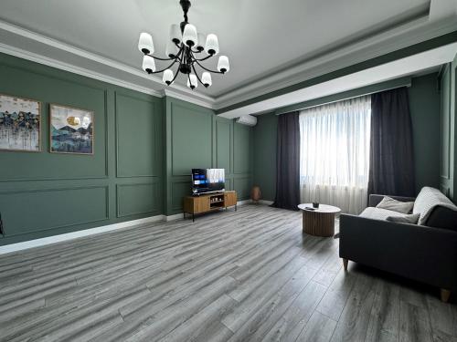 TV a/nebo společenská místnost v ubytování Premium Khatai Residence Boulevard, Victory Park