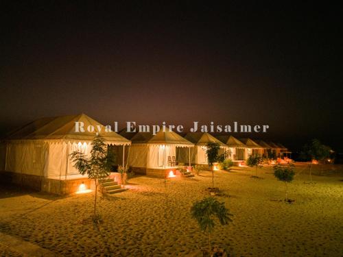 a marquee that says royal empire jasmine in front of a tent at Royal Empire Camp & Resort Jaisalmer in Sām