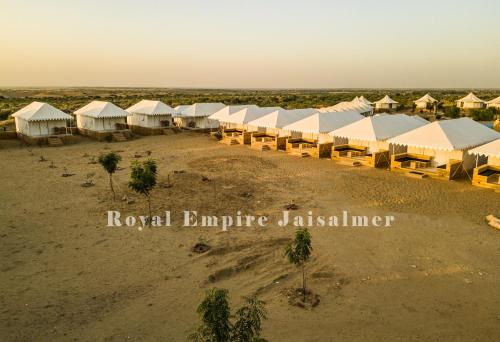 an overhead view of a row of tents in the desert at Royal Empire Camp & Resort Jaisalmer in Sām