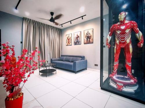 a living room with a spider man statue in a room at Paradigm MarvelClassic JB Platino 3BR 10PAX in Johor Bahru