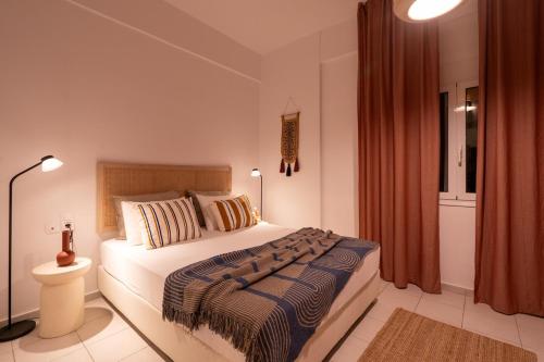 a bedroom with a large bed in a room at Coastal Key 6 in Gázion