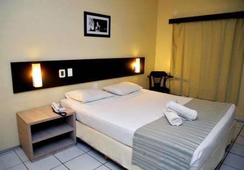 Hotel Premierにあるベッド