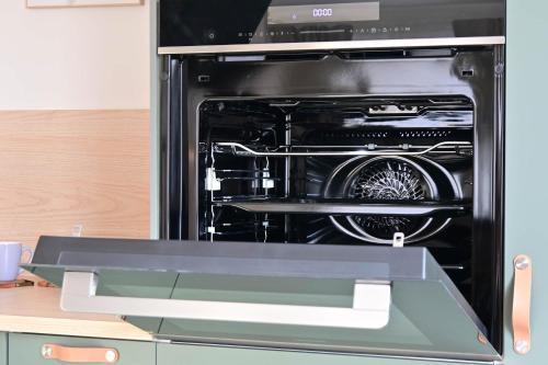Η κουζίνα ή μικρή κουζίνα στο Fjord Stay - Neue Apartment in Kiel - Free Park - 24-7 Check in - "Oslo"