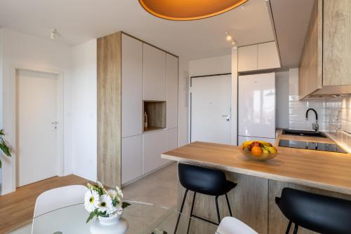Kuchyň nebo kuchyňský kout v ubytování Apartment Solin Mezanovci