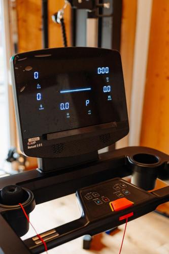 Uma televisão e/ou sistema de entretenimento em Hotel Rupertihof