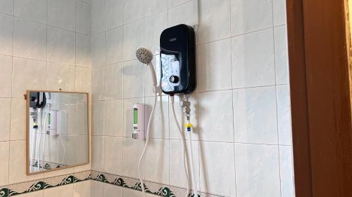 Koupelna v ubytování NEW Xing Yue Hotel 星悦自助酒店