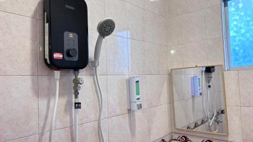 Ένα μπάνιο στο NEW Xing Yue Hotel 星悦自助酒店