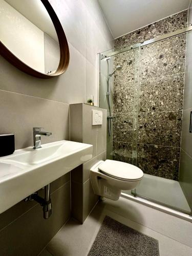 Ένα μπάνιο στο Luxury Suites Park by Rikas Hotels