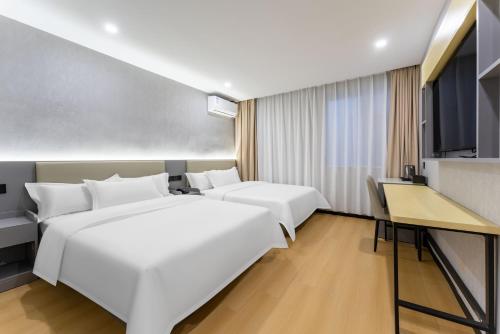 Foto dalla galleria di World Smart Hotel Shandong Cancer Hospital Branch a Jinan