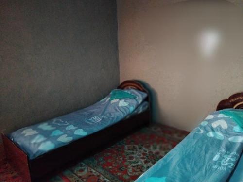 Postel nebo postele na pokoji v ubytování Akchakul Yurt Camp