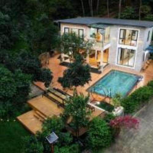 an aerial view of a house with a swimming pool at SH Homestay - Venuestay in Sóc Sơn