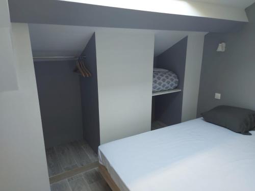 Postel nebo postele na pokoji v ubytování Ardenn'Hotel