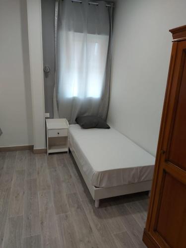 Postel nebo postele na pokoji v ubytování Ardenn'Hotel