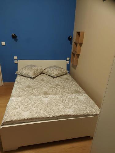 Postel nebo postele na pokoji v ubytování Ardenn'Hotel