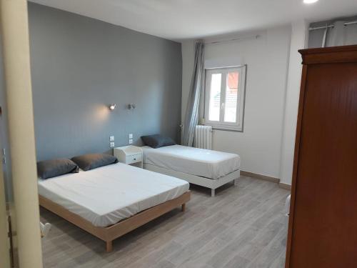 Postel nebo postele na pokoji v ubytování Ardenn'Hotel
