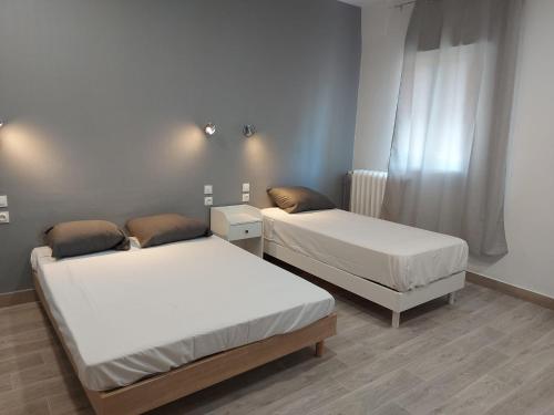 Postel nebo postele na pokoji v ubytování Ardenn'Hotel