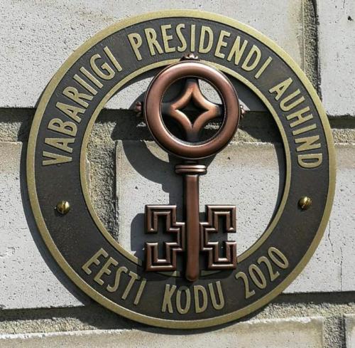 a sign for the london presbyterian church on a building at Puhkemaja Peretuba in Obinitsa