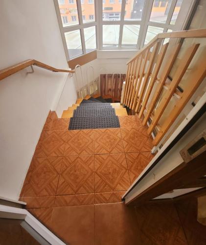 an overhead view of a stairway with a rug at Penzion u Martina in Liberec