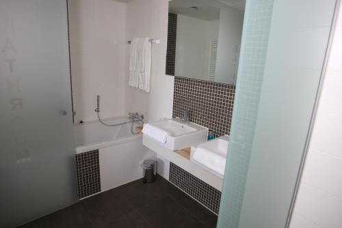 Koupelna v ubytování Fletcher Wellness-Hotel Stadspark