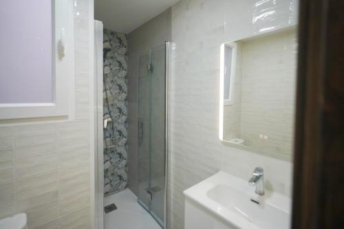 Ένα μπάνιο στο Desigual apartamento con 3 AC