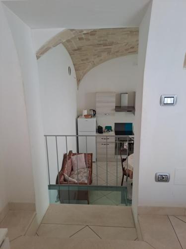 a view of a living room with a glass table at DOMUS CIVITELLA - Chieti in Chieti