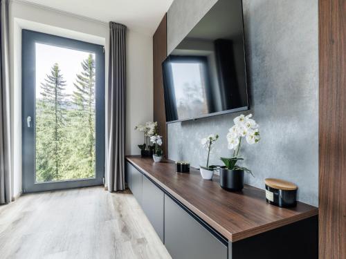 TV a/nebo společenská místnost v ubytování Easyhomes holiday