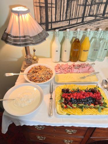 a table with a tray of food on a table at Uplands Guest House in Ledbury