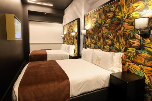 Voodi või voodid majutusasutuse Hotel Sky Cape Town toas
