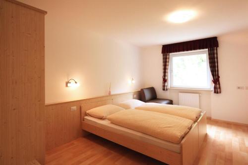 Giường trong phòng chung tại Villa Otto