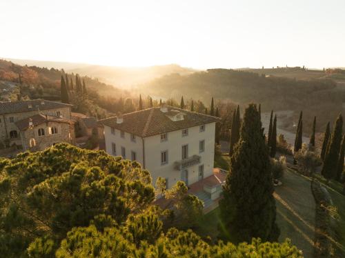 an aerial view of a house on a hill at One Belvedere Tuscany in Poggibonsi