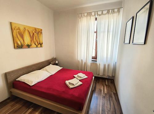 Posteľ alebo postele v izbe v ubytovaní Apartament Premium