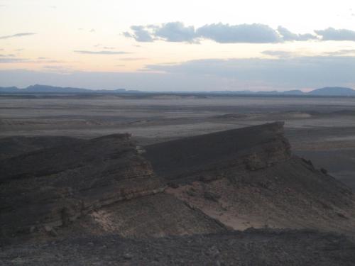 an aerial view of the desert with the sky at Maison Boutchrafine in Erfoud