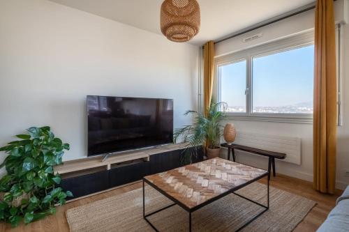 Μια τηλεόραση ή/και κέντρο ψυχαγωγίας στο Appartement Mi-Luna - Welkeys