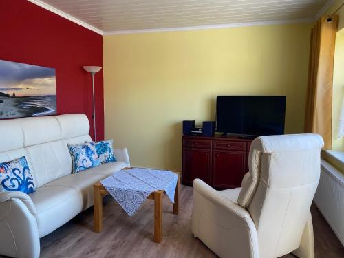 TV a/nebo společenská místnost v ubytování Haus Usedom