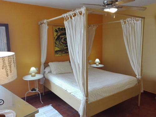Ένα ή περισσότερα κρεβάτια σε δωμάτιο στο La Posada del Recovero