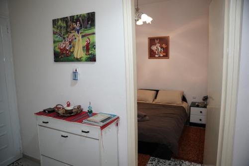 Ένα ή περισσότερα κρεβάτια σε δωμάτιο στο Trikala Apartments