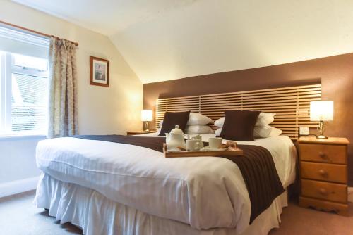 Ένα ή περισσότερα κρεβάτια σε δωμάτιο στο The Bentley Brook Inn