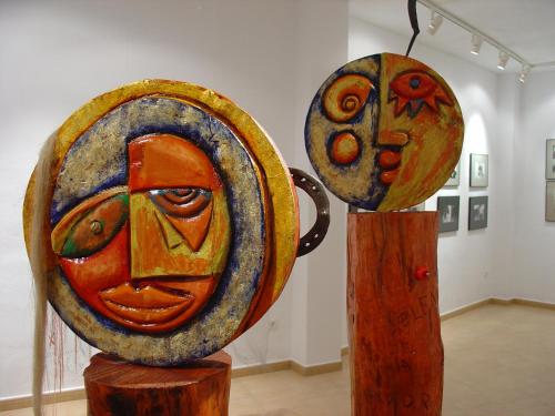 two pieces of art on display in a museum at La Posada del Recovero in Genalguacil