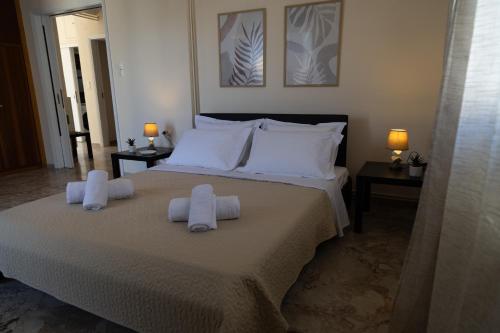 Ένα ή περισσότερα κρεβάτια σε δωμάτιο στο Evillion