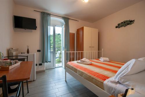 Postel nebo postele na pokoji v ubytování Volo Rooms by Arbaspàa