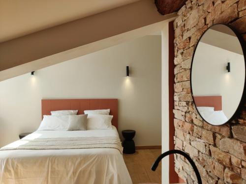 Postel nebo postele na pokoji v ubytování Chambres d'hôtes - Bed and Breakfast Les Palmiers