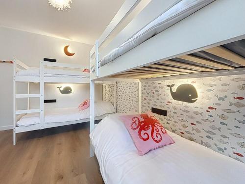 Postel nebo postele na pokoji v ubytování Maison Martha in Oostduinkerke