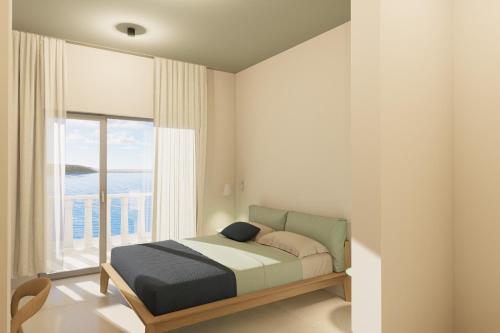 a bedroom with a bed and a large window at Villa Segetski dvori - Tradition since 1964 in Trogir