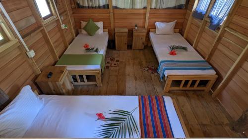 Postel nebo postele na pokoji v ubytování Ocean bliss hiriketiya